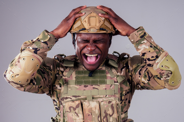 america african man crying sorrow mourning bombing in studio shoot - Stock Photo - Images