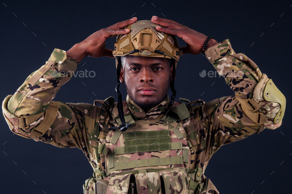 american man in camouflage suit sorrow - Stock Photo - Images