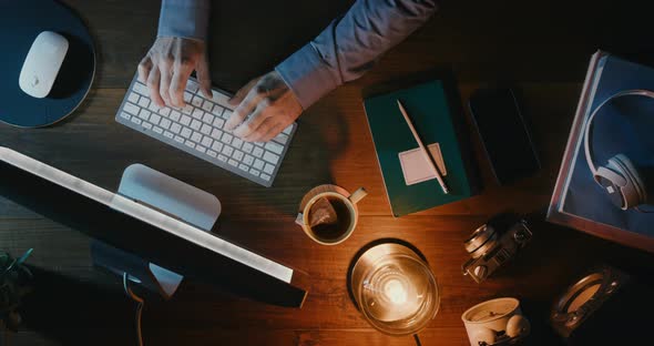 Businessman sitting at office desk and working