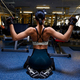 Athletic woman in the gym showing muscles - PhotoDune Item for Sale