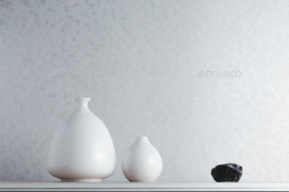 Minimalist interior home deisgn with a couple of vase and black obsidian stone, includes copy space