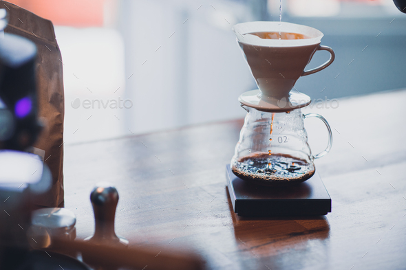 Third wave coffee brewing method: V60 coffee dripping iview from a vintage coffee shop.