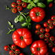 Tomatoes and basil on black background, top view, flat lay - PhotoDune Item for Sale
