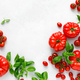 Tomatoes and basil on white background, top view, flat lay - PhotoDune Item for Sale