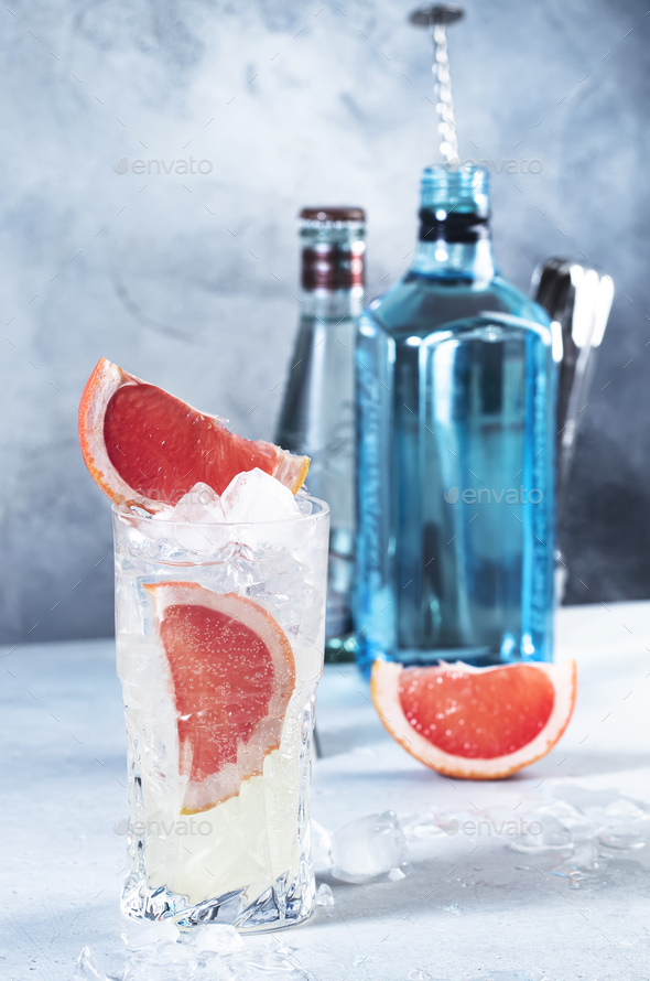 Gin tonic alcoholic cocktail drink with dry gin, bitter tonic, lemon