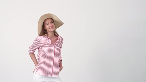 Woman Posing in Large Hat