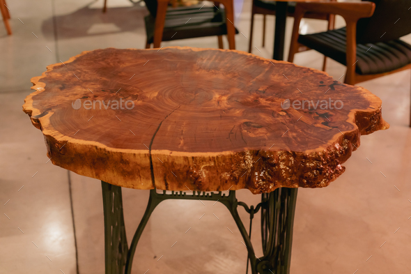 Handmade epoxy resin round wood table. Live edge table