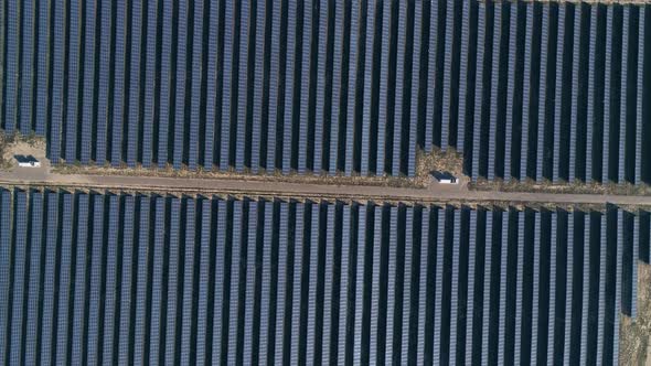 Flight Over Solar Panel Farm Top Down View
