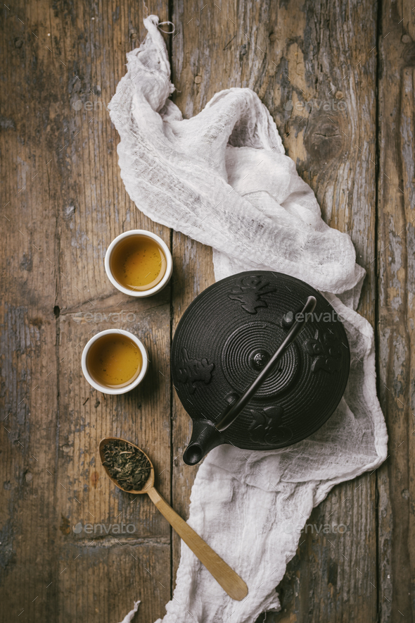 Traditional japanese herbal tea recipe prepared in cast iron teapot Stock Photo by hitdelight