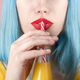 Closeup of female mouth drinking summer cocktail. - PhotoDune Item for Sale