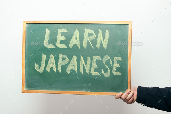 chalkboard with LEARN JAPANESE written in chalk