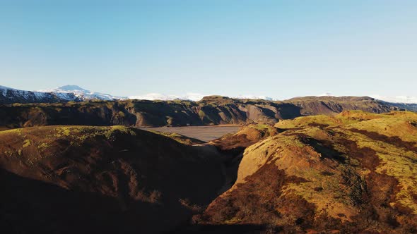 Drone Rising Over Hvannagil Canyon Under Blue Sky alt