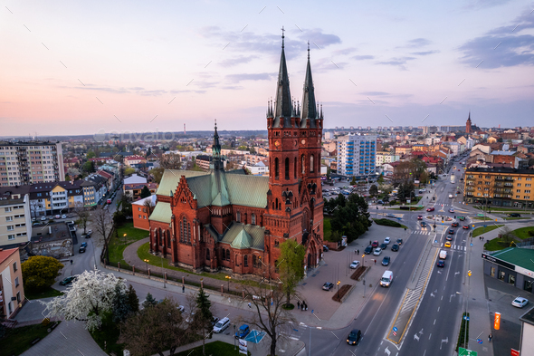 Holy Family Cathedral Church in Tarnow, Poland. Skyline of City Illuminated at Dusk.
