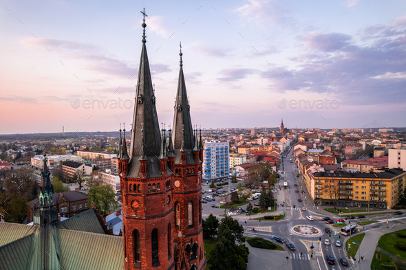 Holy Family Cathedral Church in Tarnow, Poland. Skyline of City Illuminated at Dusk.