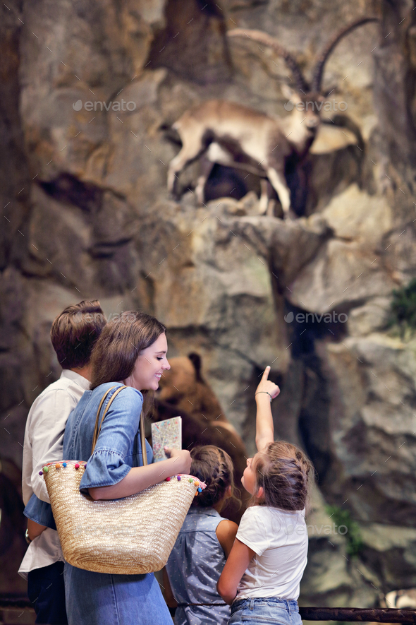 Joyful family in nature museum
