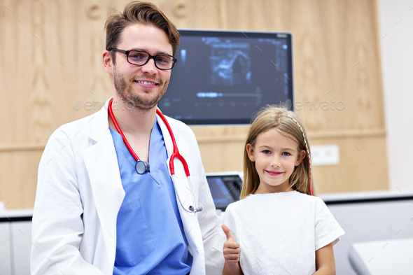 Doctor testing young girl with usg - Stock Photo - Images
