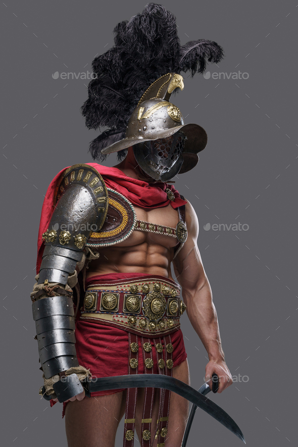 Handsome greek gladiator with dual swords and plumed helmet Stock Photo ...