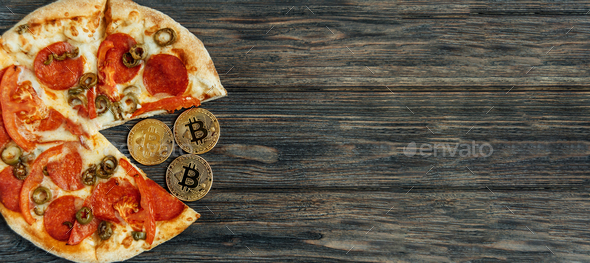 Bitcoin Pizza Day 22 May. Cryptocommunity holiday. concept of buying pizza with bitcoin.
