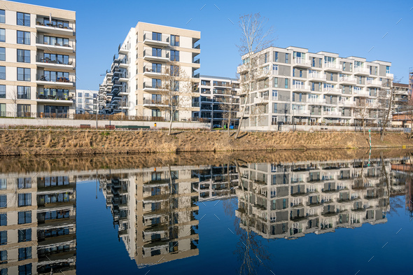 Modern apartment buildings at the waterfront - Stock Photo - Images