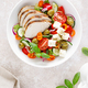 Grilled chicken breast and fresh greek salad with feta cheese. Top view - PhotoDune Item for Sale