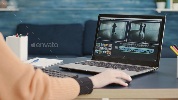 Content creator editing video montage on film production software