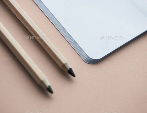 Blank notebook and pencil isolated on background - Stock Photo - Images