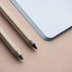 Blank notebook and pencil isolated on background - PhotoDune Item for Sale