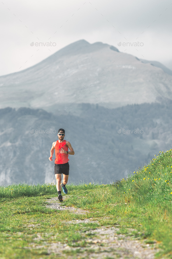Runner during a mountain preoaration - Stock Photo - Images