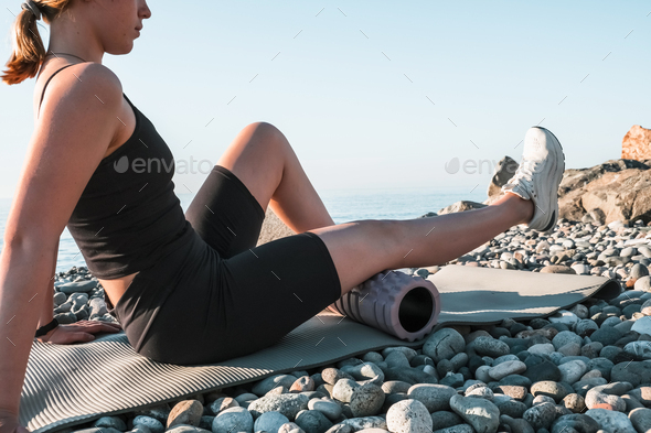 fit outdoor sea.girl goes sports, fitness, yoga seashore. Meditation, relaxation, mental health