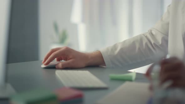Closeup Doctor Hands Typing on Computer Keyboard alt