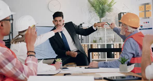 Main Manager of Building Company Explaining Project on Glass Wall alt