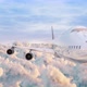 Airplane Jumbo Jet Front View Fyling Over Puffy Clouds Sunlight And Blue Sky Seamless Loop - VideoHive Item for Sale
