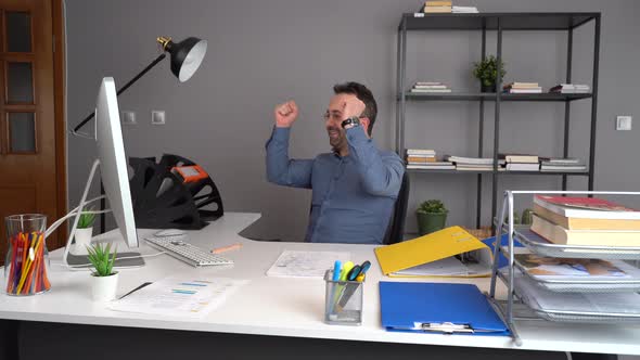 Successful and happy office worker. alt