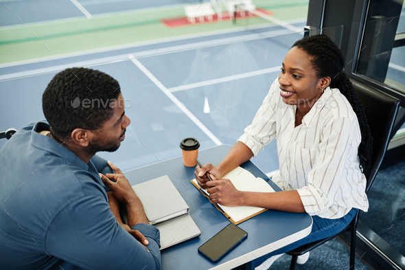 Sports Manager Interviewing Client