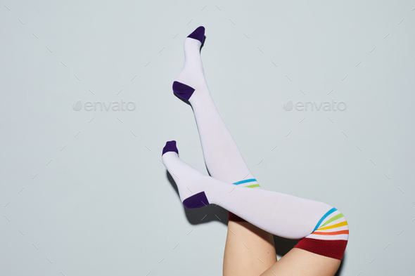 Playful Girl in Knee Socks