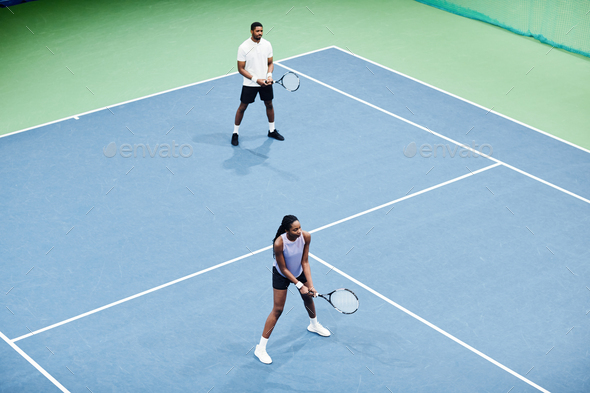 Couple at Tennis Practice Minimal
