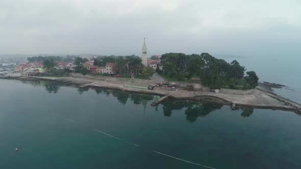 Aerial view of St. Euphemia basilica on an island alt