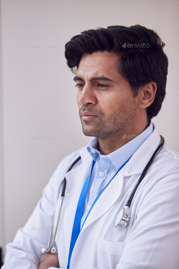 Portrait Of Male Doctor Or GP with Stethoscope Wearing White Coat ...