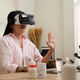 asian woman telemedicine doctor online visit with virtual reality technology vr glasses at home - PhotoDune Item for Sale
