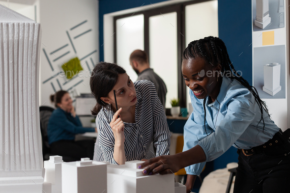 Women of architect profession standing at desk office Stock Photo by DC ...