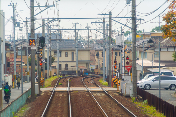 Japanese railway with a local train run through city. Tourist attraction