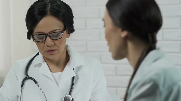 Unhappy Woman Complaining About Disease to Gynecologist, Incurable Illness alt