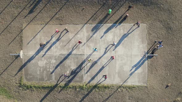 Aerial View Directly Above Group of Men Playing Basketball