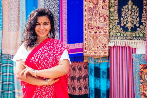 business lady in red traditional sari and jewelery clothes shop owner cashmere yak