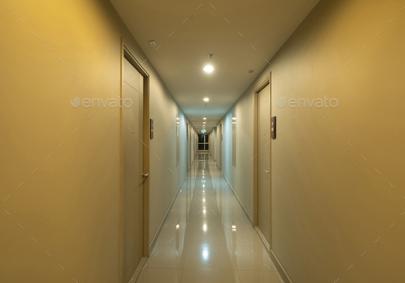Empty condo, hotel or apartment corridor hallway in condominium building, modern walkway