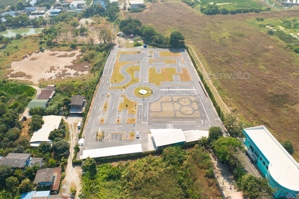 Aerial top view of a car driving test center with street. Course field, practice vehicle school.