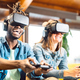 Millenial couple playing with vr glasses at home couch - PhotoDune Item for Sale