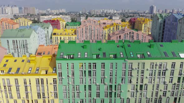 Top view of the colorful modern buildings, aerial footage from the drone alt