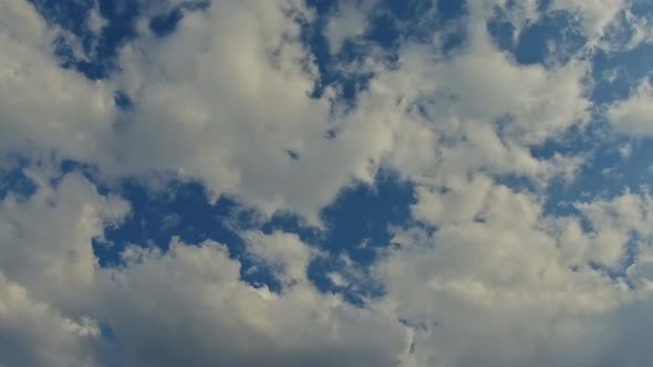 Blue Sky Background with Clouds alt