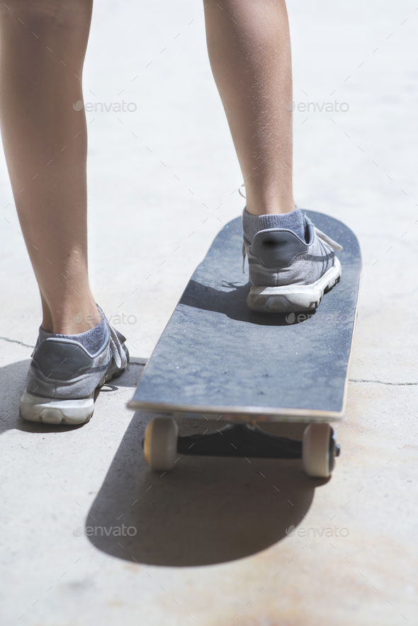 Close-up skateboarder  ready for action - Stock Photo - Images